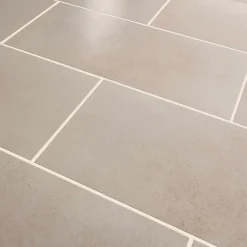 GoodHome Carrelage sol effet béton ivoire L.61,7 x l.30,7 cm x ép.7,4 mm, Konkrete