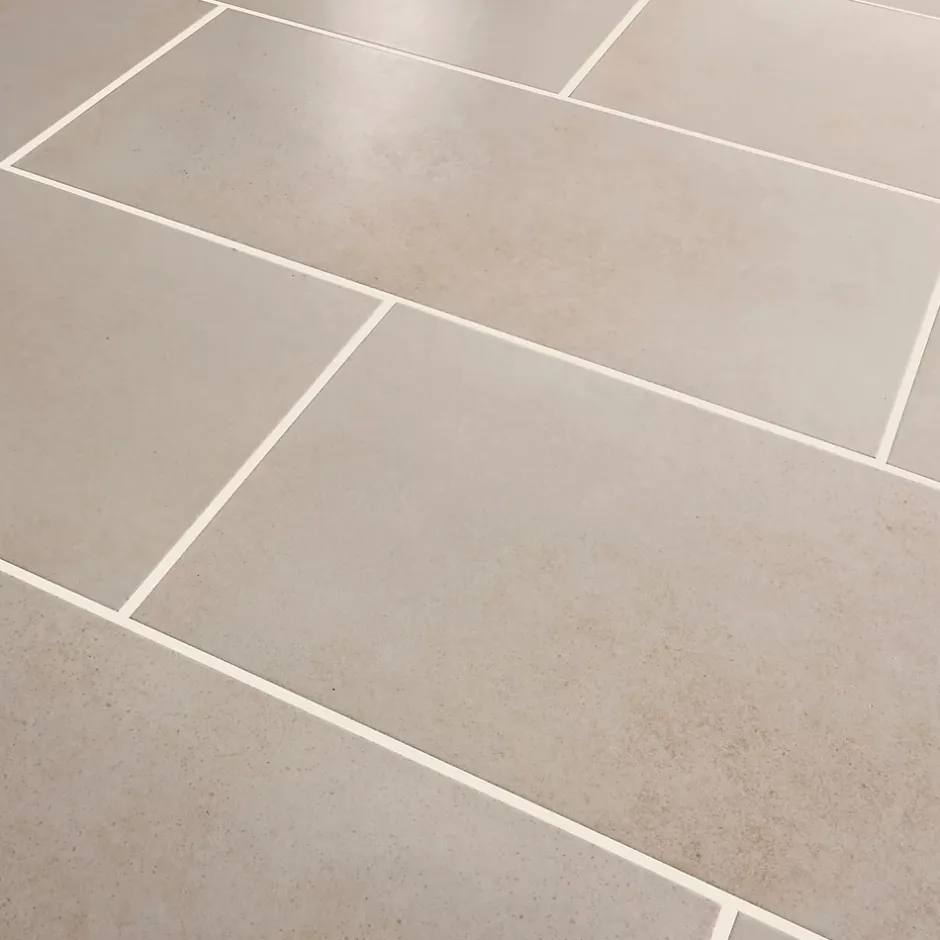 GoodHome Carrelage sol effet béton ivoire L.61,7 x l.30,7 cm x ép.7,4 mm, Konkrete