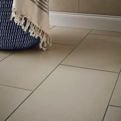 GoodHome Carrelage sol effet béton ivoire L.61,7 x l.30,7 cm x ép.7,4 mm, Konkrete