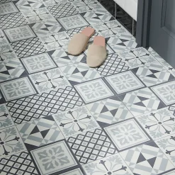 GoodHome Dalle PVC adhésive effet carreaux de ciment noir et blanc L.30,5 x l.30,5 cm x ép.2 mm, Poprock