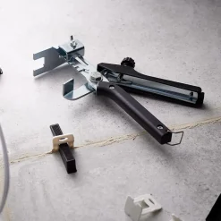 Kit complet 100 croisillons niveleurs écart 2 mm + 100 cales de nivellement + 1 pince Diall- Discount