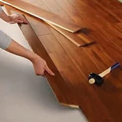 Parquet massif à coller en teck finition vernis mat coloris brun l.12 x ép.1,2 cm- Sale