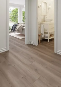 GoodHome Sol stratifié Bolton , passage intense AC5, effet chêne brun, L.126,1 cm x l.24,4 cm x ép.10 mm, résistant à l'eau