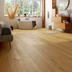 GoodHome Sol stratifié Byrd , passage intense AC5, effet chêne miel, L.125,7 cm x l.19,2 cm x ép.10 mm, résistant à l'eau