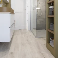 GoodHome Sol stratifié Cleobury , passage intense AC5, effet chêne blanchi, L.126,1 cm x l.19,2 cm x ép.10 mm, résistant à l'eau