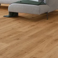 Sol stratifié Cortland , passage élevé AC4, effet chêne miel, L.128,5 cm x l.19,2 cm x ép.8 mm, résistant à l'eau-GoodHome Online