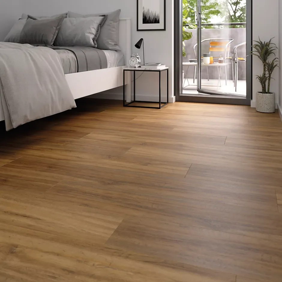 GoodHome Sol stratifié Devonport , passage élevé AC4, effet chêne miel, L.128,6 cm x l.19,4 cm x ép.8 mm