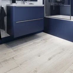 GoodHome Sol stratifié Rowley , passage élevé AC4, effet chêne blanchi, L.129,2 cm x l.19,3 cm x ép.8 mm, résistant à l'eau